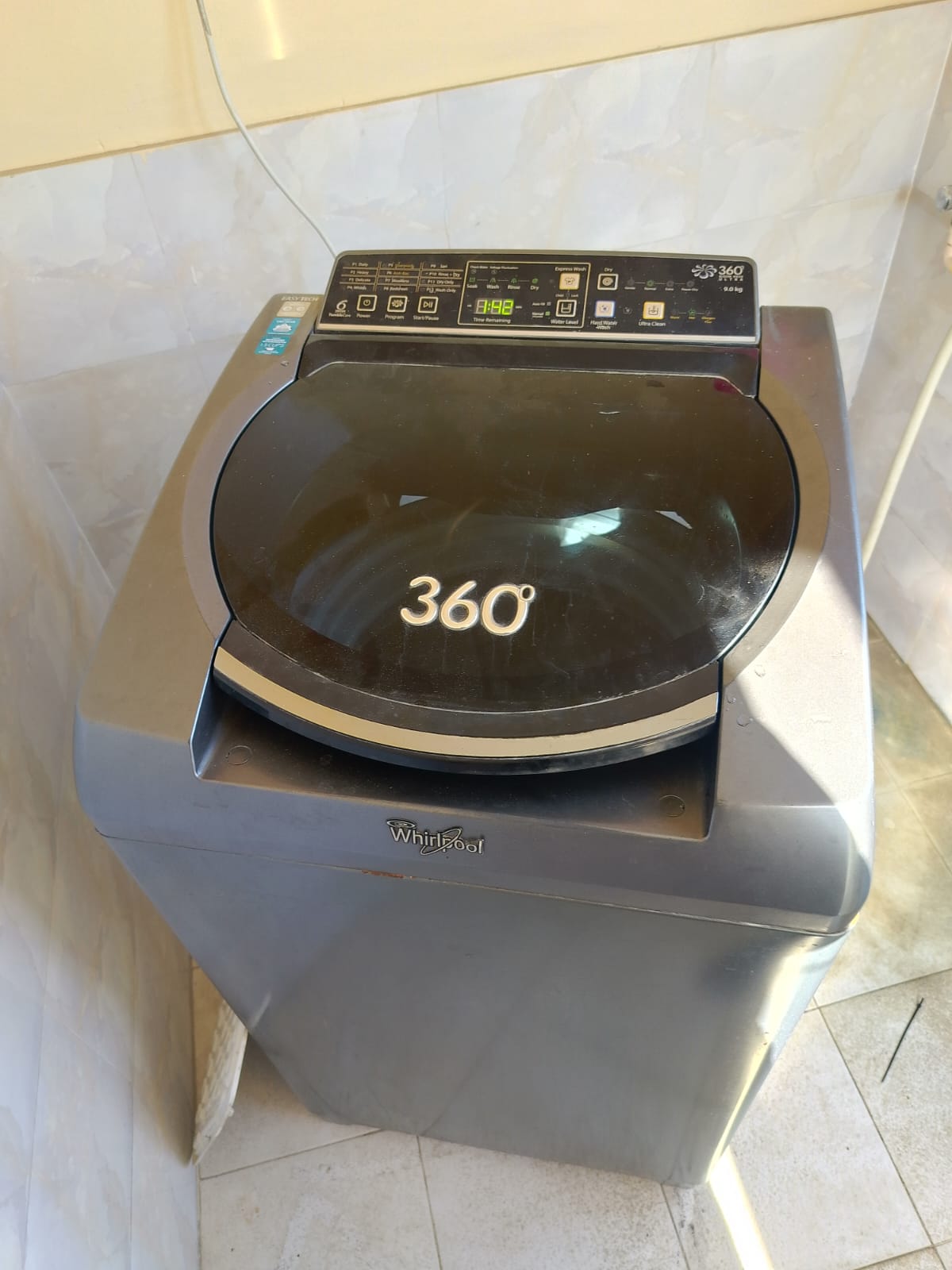 Whirlpool top-load washing machine servicing completed in Boudhaa, Kathmandu